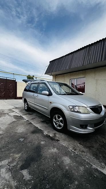 Транспорт: Mazda : 2003 г., Кол менен иштөөчү, Бензин — 1
