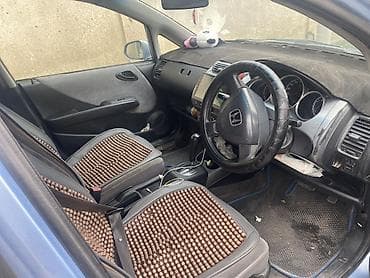 109 стиль: Honda Fit: 2002 г., Бензин — 5