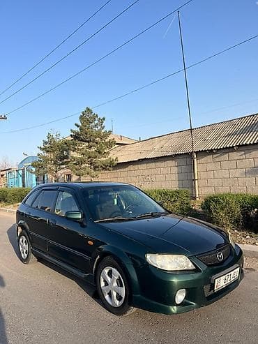 2 4 д: Mazda 323: 2000 г., 2 л, Механика, Бензин, Хэтчбэк — 2