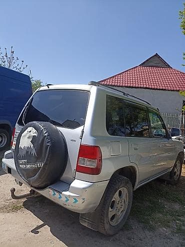 mitsubishi challenger: Mitsubishi Pajero iO: 2003 г., Автомат, Бензин, Внедорожник — 7