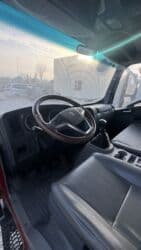 уборочная машина: Поливомоечный автомобиль HOWO (красная кабина) с цистерной. Основные — 5