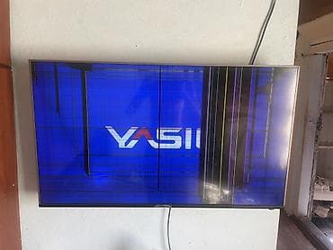 smart display: Телевизор Vizio, диагональ около 55" (серия D/E/M; логотип VIZIO на — 1