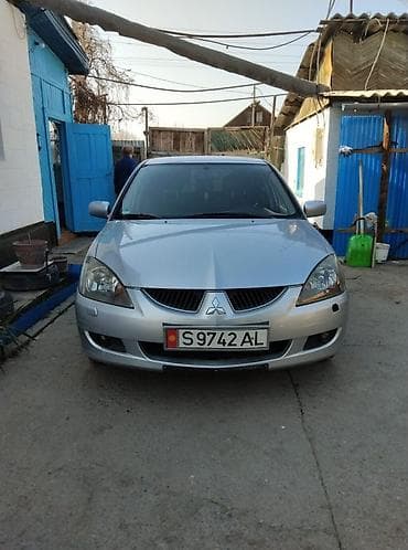 Продажа авто: Mitsubishi Lancer: 2004 г., 2 л, Механика, Бензин, Универсал — 5