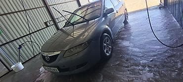 м рул: Mazda 6: 2005 г., 1.8 л, Кол менен иштөөчү, Бензин, Седан — 1