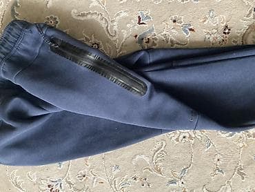 найк толстовка: Мужские джоггеры Nike Tech Fleece темно-синего цвета. Модель выполнена — 3