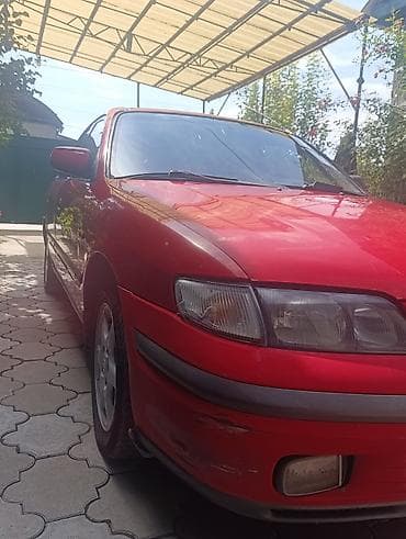 бампер на демио: Mazda 626: 1998 г., 2 л, Механика, Бензин, Лифтбек — 1