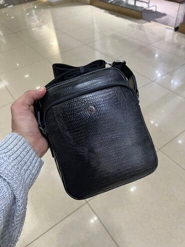 Барсетка от Butun Материал: натуральная кожа, производство Турция