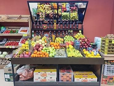 бананы: Продам витрины для овощей Ассортимент: - Бананы, ананасы, апельсины — 5