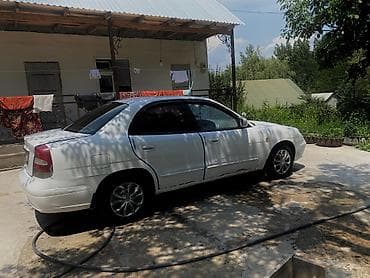 Унаа: Daewoo Nubira: 2001 г., 1.6 л, Кол менен иштөөчү, Бензин, Седан — 10