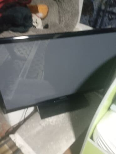 LED телевизор на подставке - Диагональ ориентировочно 32–40" (в