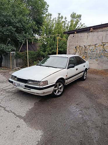mazda 2: Mazda 626: 1990 г., 2 л, Механика, Бензин, Хэтчбэк — 6