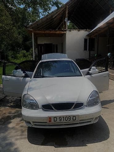 Унаа: Daewoo Nubira: 2001 г., 1.6 л, Кол менен иштөөчү, Бензин, Седан — 1