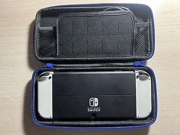 nintendo switch сколько стоит: Игровая консоль Nintendo Switch OLED (белые Joy‑Con) - Экран 7" OLED — 7