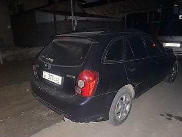 honda stream: Mazda Familia: 2003 г., Универсал — 2