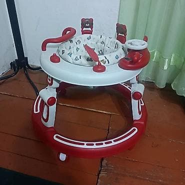 Детские ходунки-игровой центр - Круглая устойчивая база с поворотными