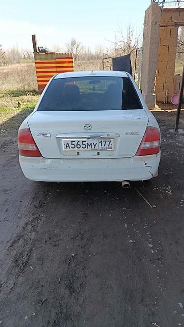 мазда фамилия: Mazda Familia: 2001 г., Автомат, Седан — 2