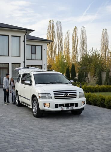 продаю связи с переездом: Infiniti QX56: 2005 г., 5.6 л, Автомат, Газ, Внедорожник — 2