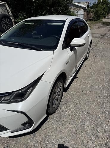 crown 2018: Toyota Corolla: 2019 г., 1.8 л, Вариатор, Гибрид, Седан — 9