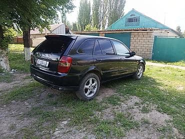 Mazda 323: 2001 г., 2 л, Механика, Бензин, Хэтчбэк