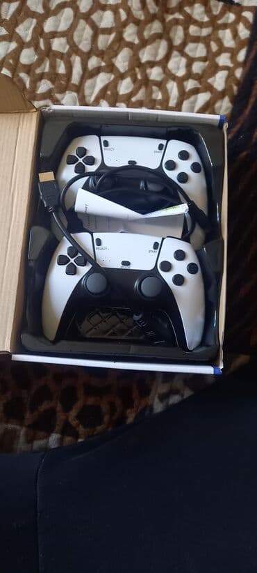 диск ufc 4: Игровая приставка Game Stick Pro 4K с двумя беспроводными геймпадами — 1