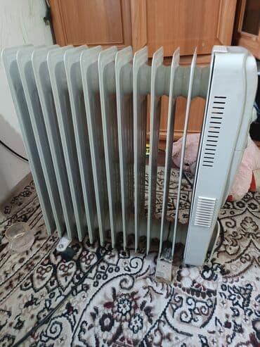 или меняю с доплатой мне: Обогреватель масляный 12 секции работает греется отлично адрес — 2