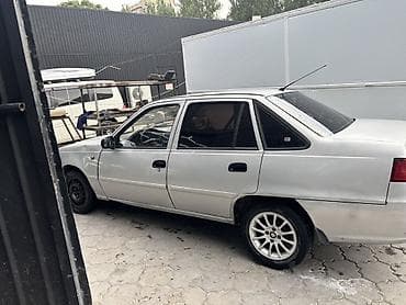 geely galaxy e5: Daewoo Nexia: 2010 г., 1.6 л, Механика, Седан — 4