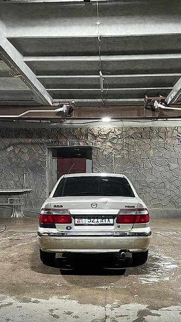 глушитель москвич: Mazda 626: 1999 г., 1.8 л, Механика, Газ — 1