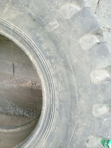шина грузовик: Шина 17.5-25, камерная (Tube Type), нейлоновый корд. Маркировки на — 1