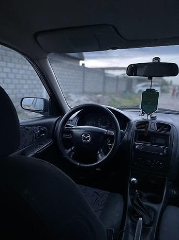 хонда истеп 1: Mazda Familia: 1999 г., 1.5 л, Кол менен иштөөчү, Бензин, Универсал — 7