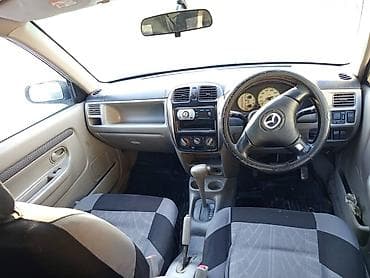 арзан машине: Mazda Demio: 2000 г., 1.5 л, Автомат, Бензин, Седан — 4