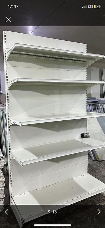 Торговое оборудование: Торговый стеллаж металлический, островной. - Конструкция — 1