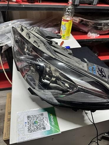 Передняя левая фара Mazda