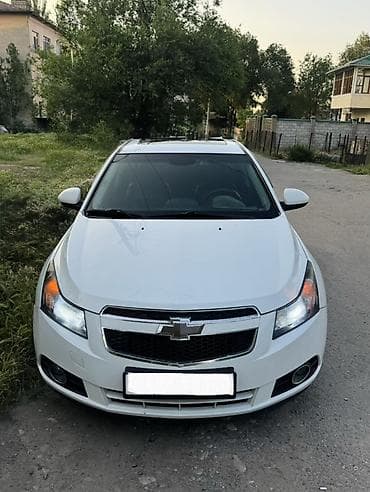 реки: Chevrolet Cruze: 2009 г., Седан — 1