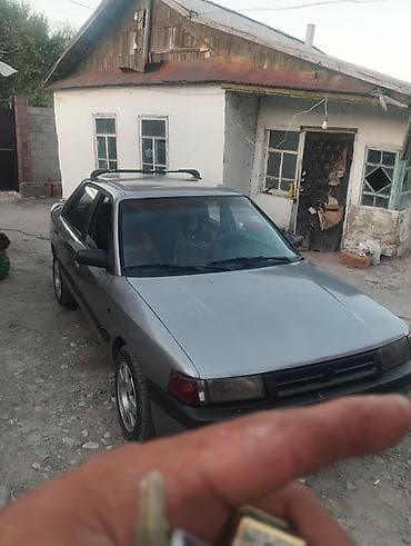 1: Mazda 323: 1989 г., 1.6 л, Механика — 3