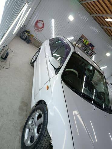 глушитель гольф 2 1.8 бензин: Mazda Familia: 2001 г., 2 л, Автомат, Бензиновая, Универсал — 4