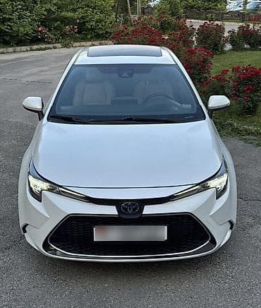 Toyota Corolla: 2021 г., 1.8 л, Вариатор, Гибрид, Седан — 1