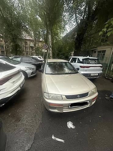 Mazda 323: 1996 г., 1.5 л, Механика, Бензин, Седан