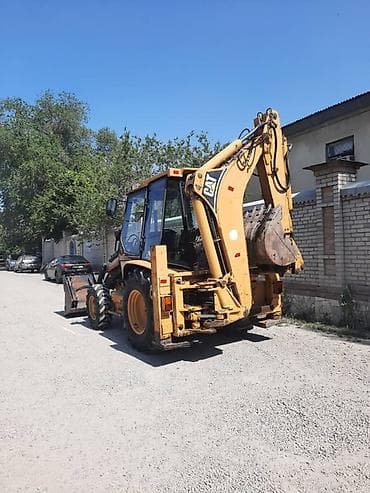 Экскаватор, Caterpillar, Колесный — 1