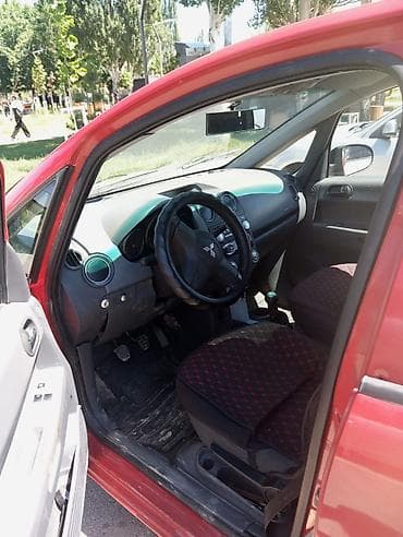Mitsubishi Colt: 2006 г., 1.3 л, Механика, Бензин, Лифтбек — 7