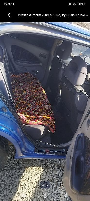 corolla verso: Nissan Almera: 2001 г., Хэтчбэк — 9