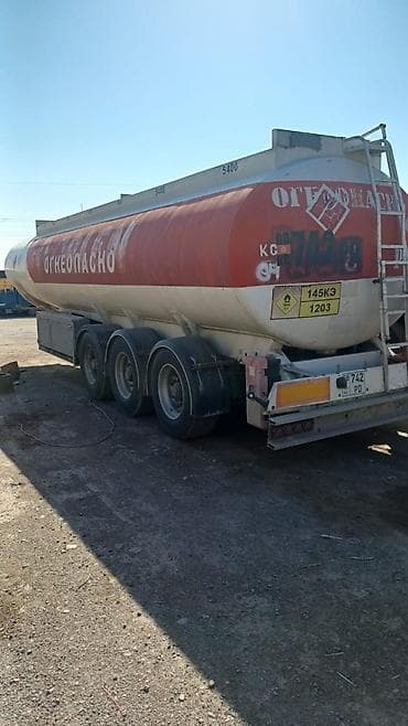 прицепы реф: Полуприцеп-цистерна для перевозки светлых нефтепродуктов 4 отсека — 2