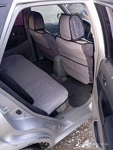 apallon r18: Mazda 323: 2002 г., 1.6 л, Автомат, Бензин, Хэтчбэк — 5