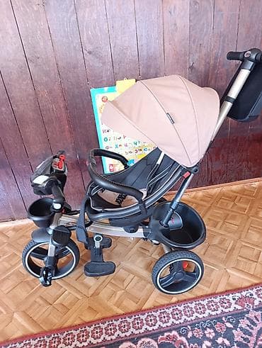 Детский мир: Детский трёхколёсный велосипед с родительской ручкой и капюшоном цены — 1