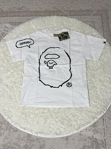 Футболки A Bathing Ape (BAPE) — белые, с фирменными принтами Ape Head at lalafo.kg Футболки A Bathing Ape (BAPE) — белые, с фирменными принтами Ape Head