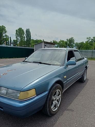 радар авто: Mazda 626: 1988 г., 2 л, Бензин, Седан — 1