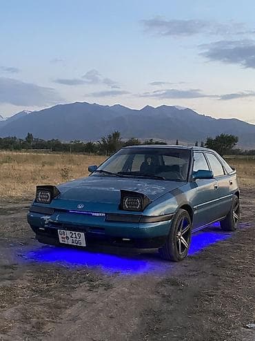 2107 газ: Mazda 323: 1992 г., 1.6 л, Механика, Бензин, Хетчбек — 3