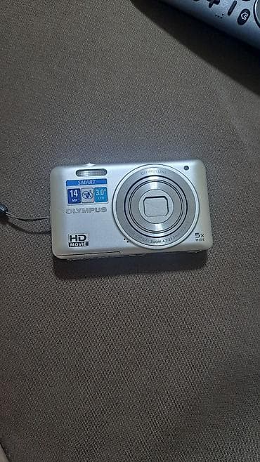 Цифровая камера Olympus компактного формата есть полоска на экране