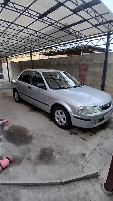 Продажа авто: Mazda 323: 1999 г., 1.5 л, Механика, Бензин, Седан — 2