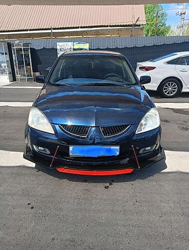 Унаа: Mitsubishi Lancer: 2005 г., 2 л, Кол менен иштөөчү, Бензин, Универсал — 1