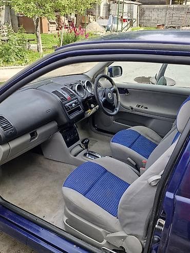 гольфы выше колена: Volkswagen Polo: 2000 г., 1.4 л, Автомат, Бензин, Хэтчбэк — 7